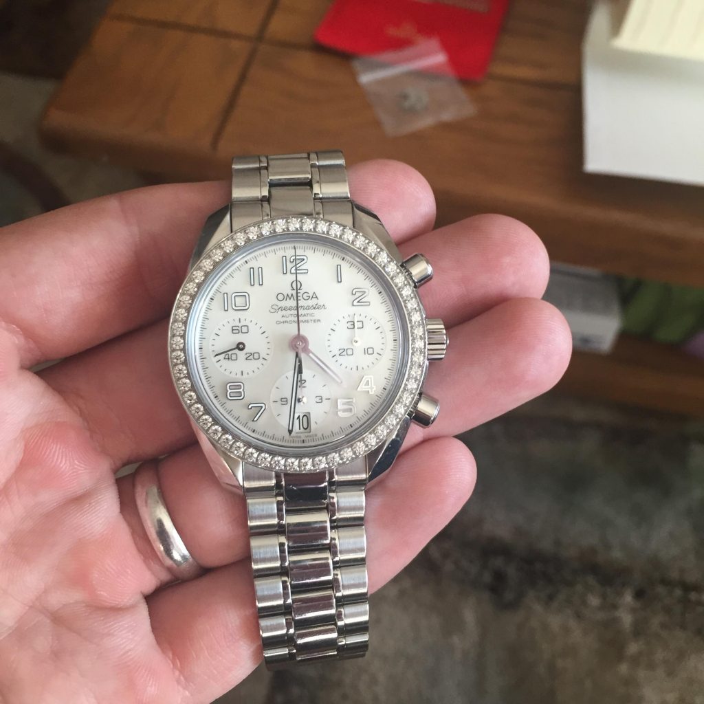 The stainless steel fake watches are decorated with diamonds.